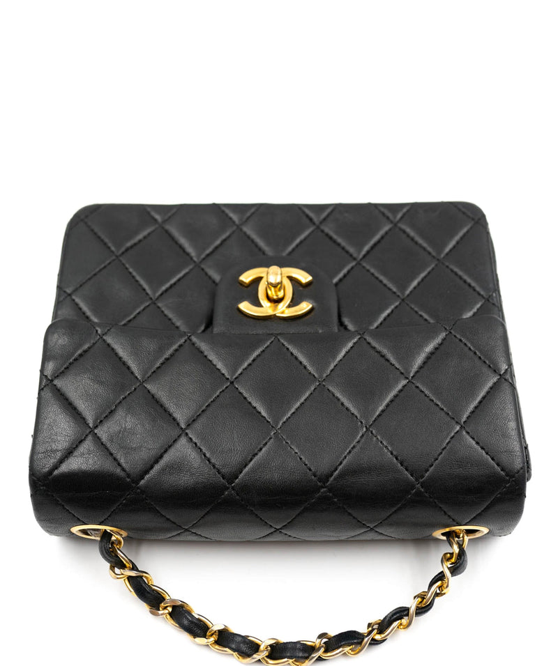 Chanel Chanel vintage mini classic flap with lambskin leather in black with 24k gilded gold hardware (serial number 1200719) ASL3304