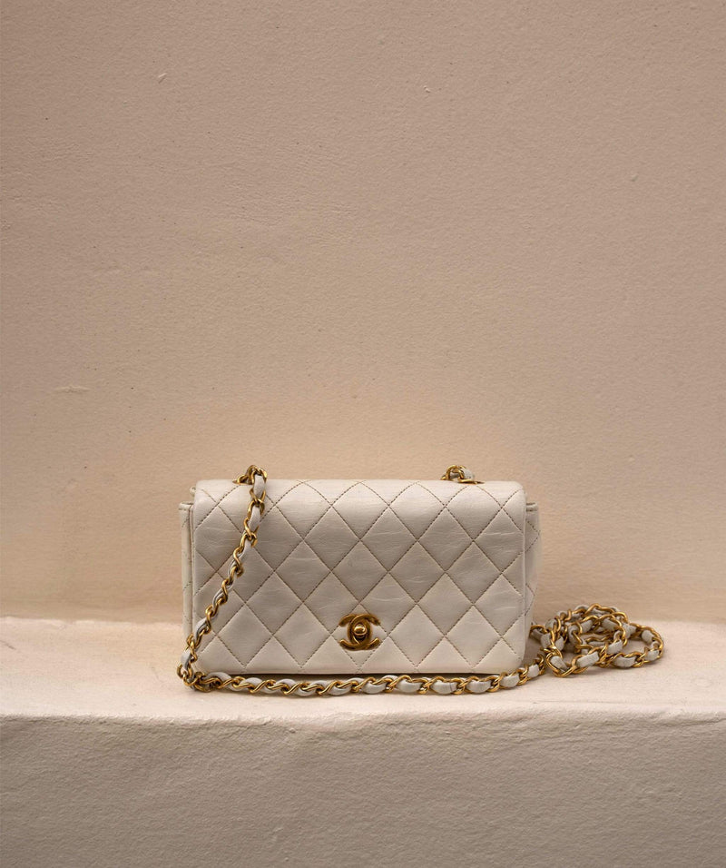 Chanel Vintage Mini White Lambskin Full Flap Bag - AWL1690 – LuxuryPromise