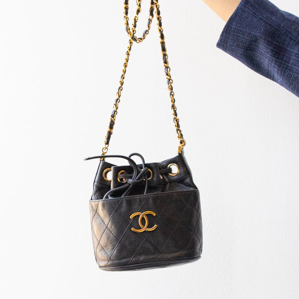 Chanel Black Stitched Calfskin Mini Drawstring Bag GHW – Love that