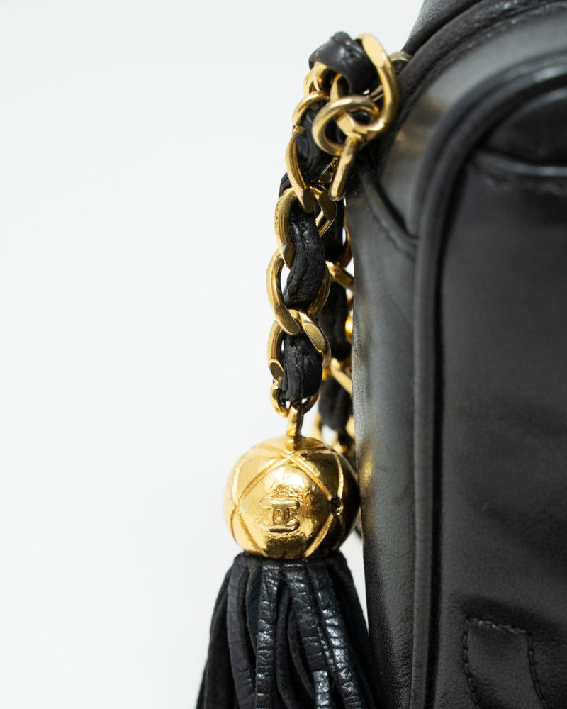 Chanel Vintage Triple CC Tassel Black Lambskin Camera Bag - AWL2635 –  LuxuryPromise