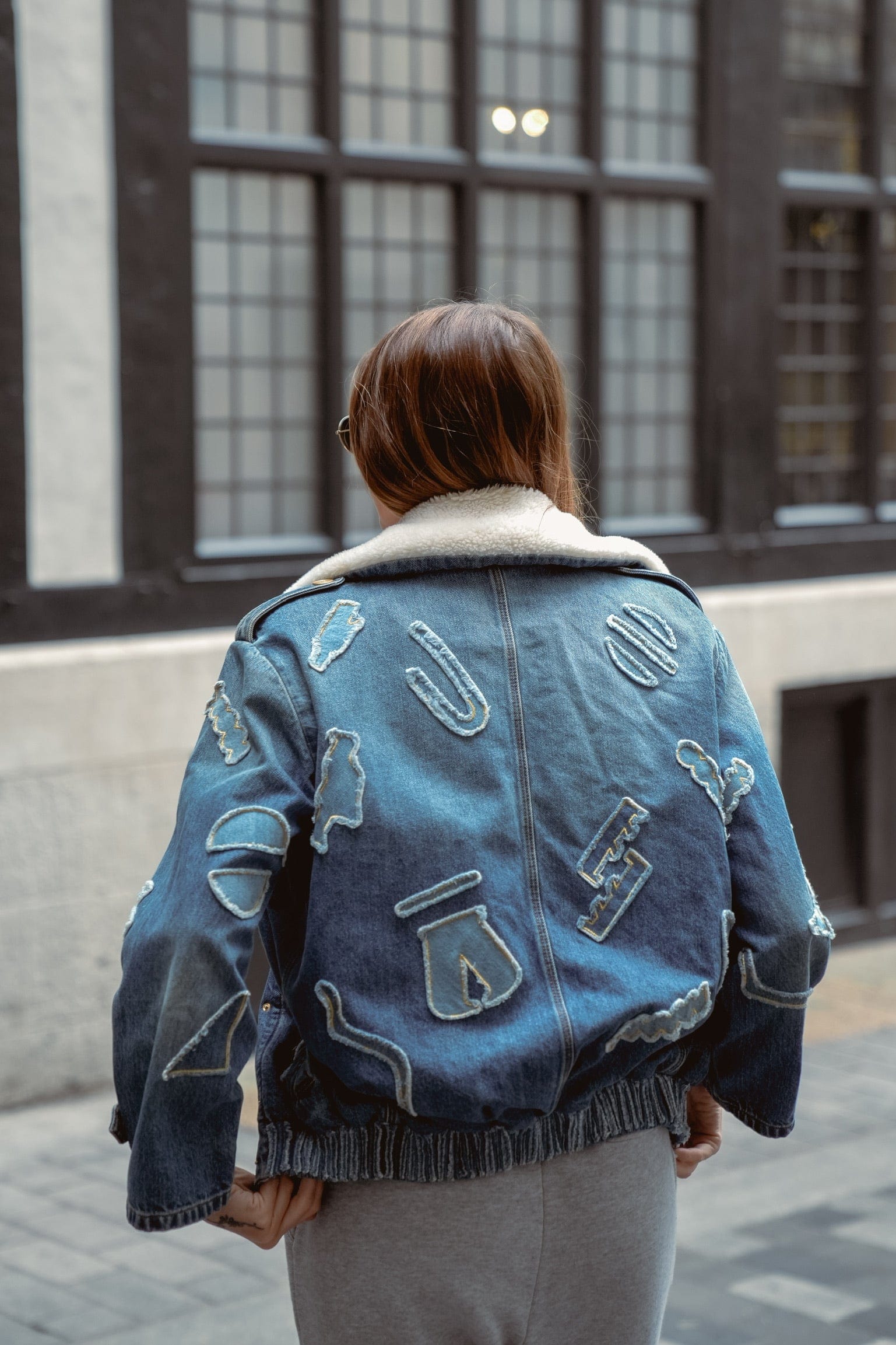 Chanel Chanel denim jacket with egyptian symbols and cream shearling collar ASL3838