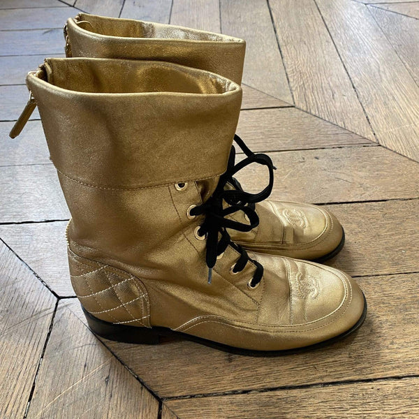 Chanel store gold boots