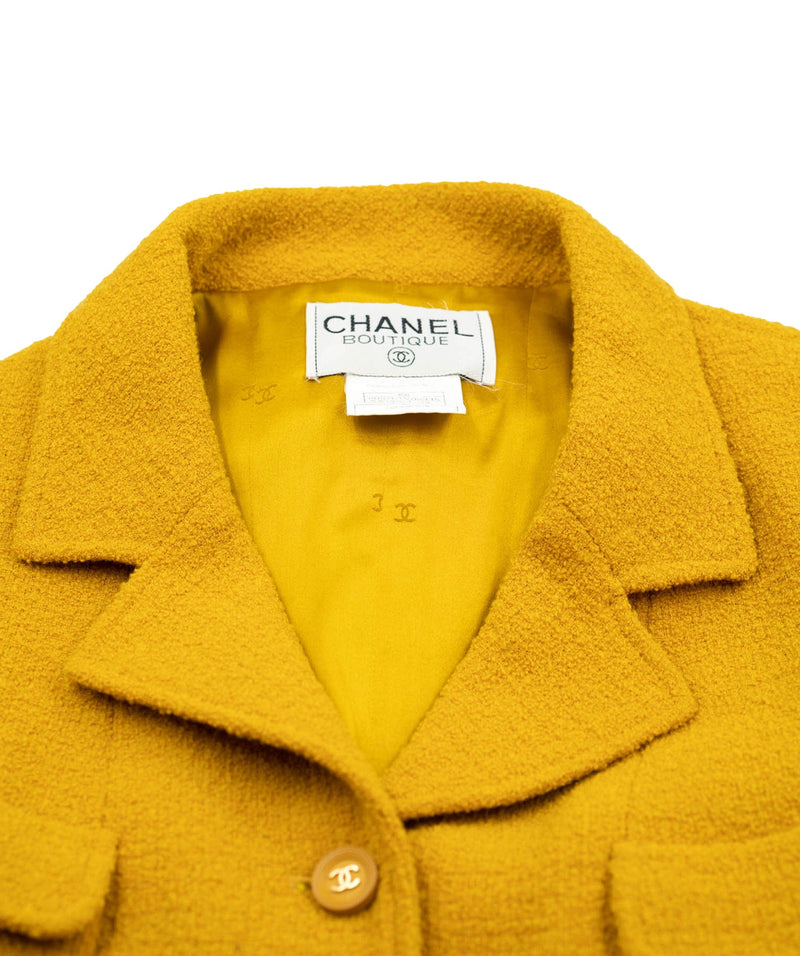 Chanel mustard yellow boucle jacket with round CC logo buttons