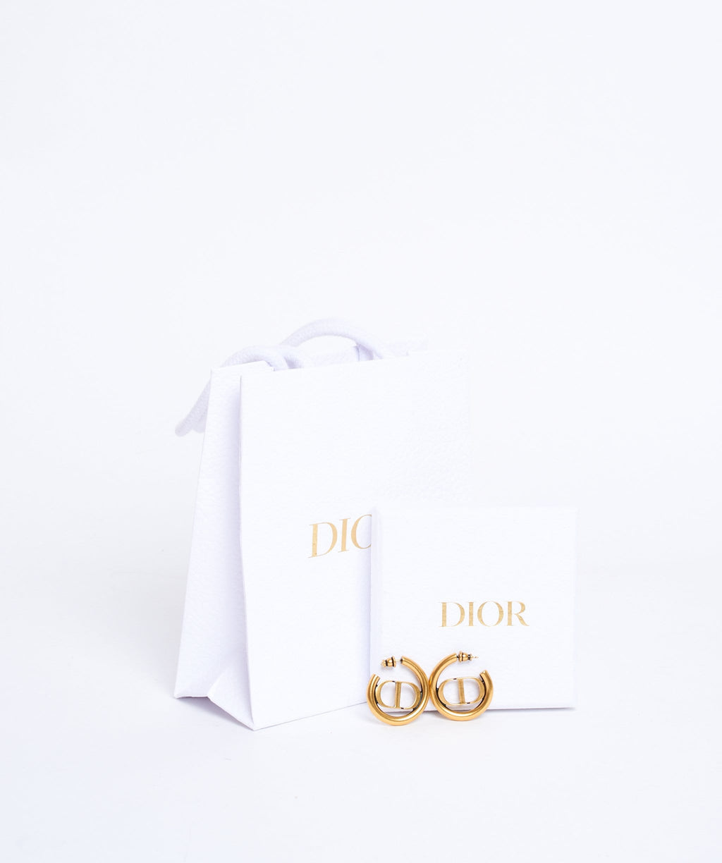 Dior 30 Montaigne hoop earrings in antique goldtone with initials in hoops   DOWNTOWN UPTOWN Genève
