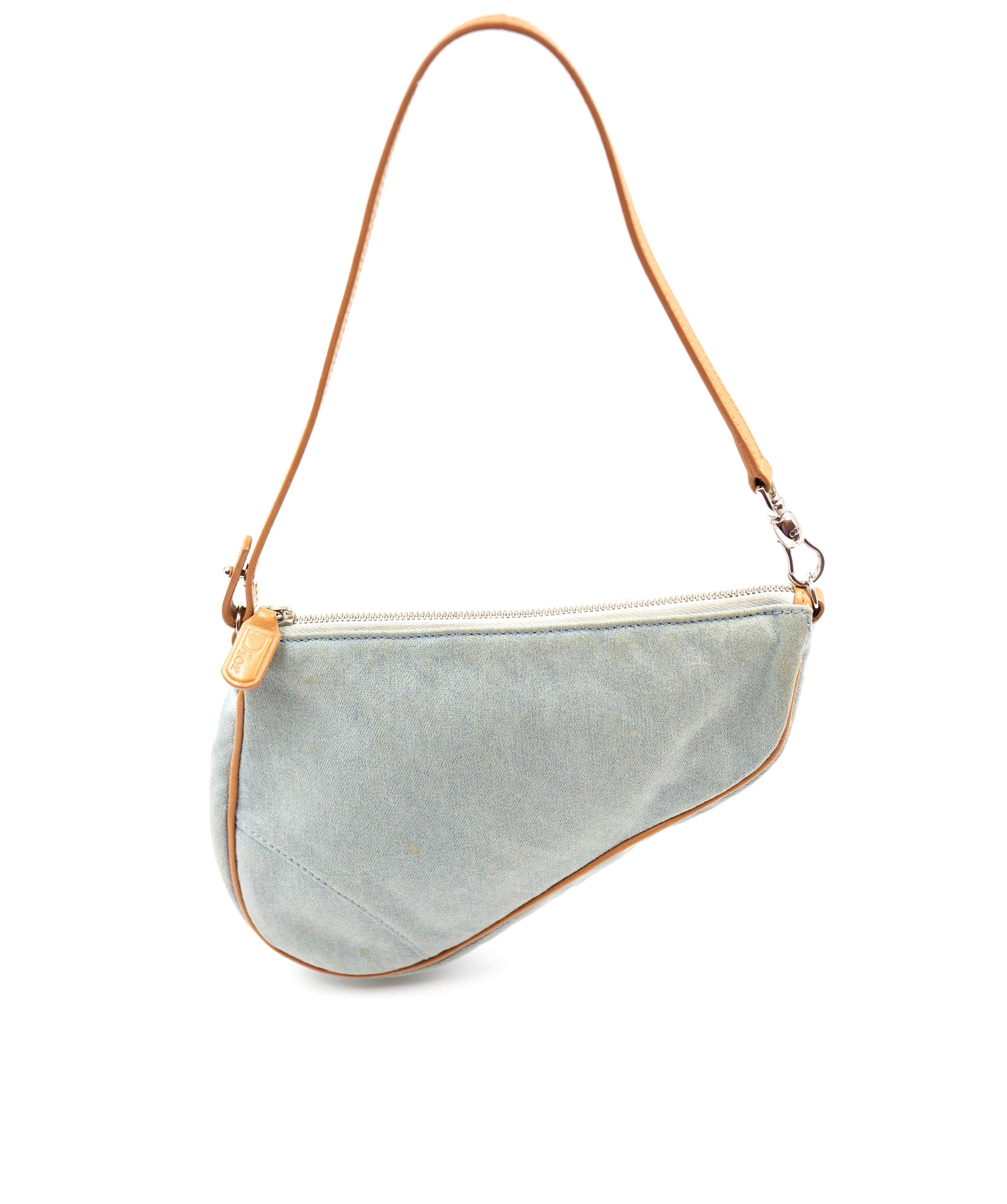 Christian Dior Christian Dior vintage light denim saddle bag. Features tan leather handle and traimmings, as well as silver hardware.  AGL2307