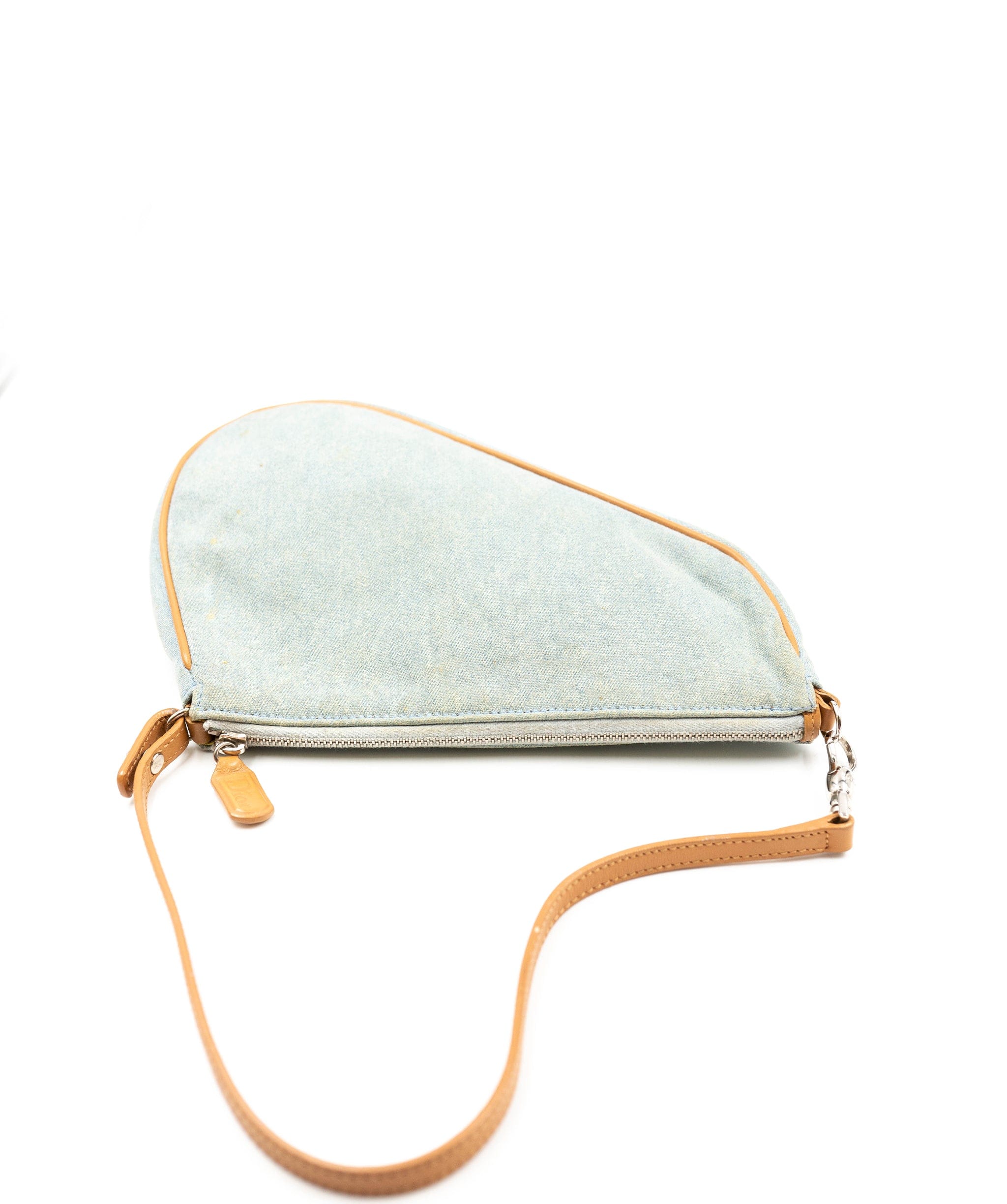 Christian Dior Christian Dior vintage light denim saddle bag. Features tan leather handle and traimmings, as well as silver hardware.  AGL2307
