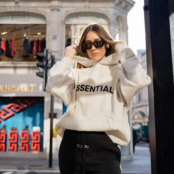 https://luxurypromise.com/cdn/shop/products/fear-of-god-essentials-clothes-shoes-fear-of-god-essentials-light-heather-oatmeal-hoodie-size-s-32267515986076_600x600_crop_center.jpg?v=1637611467