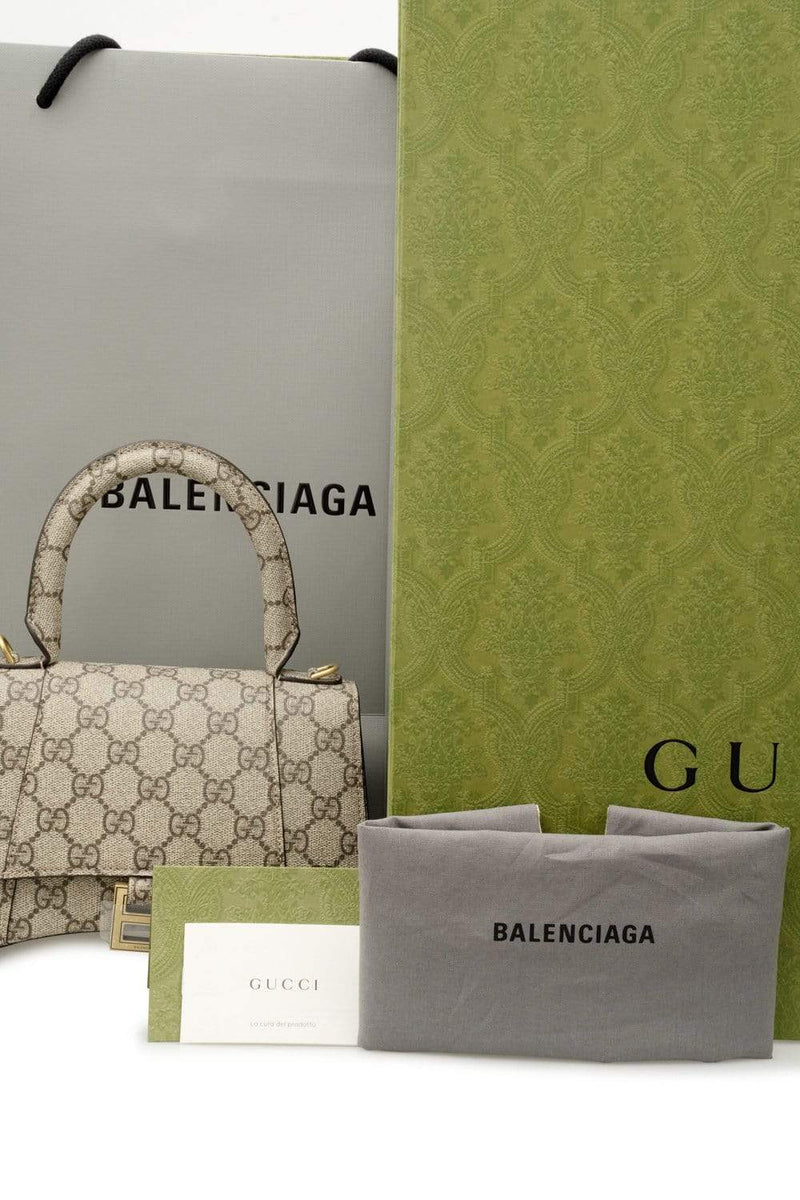 Limited edition special collaboration 2021  Gucci x Balenciaga hackers  project Balenciaga hourglass top handle handbag small with strap in Gucci  monogram Luxury Bags  Wallets on Carousell