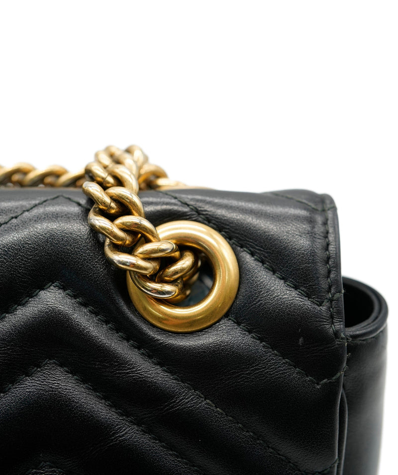 Gucci black bag gold on sale chain