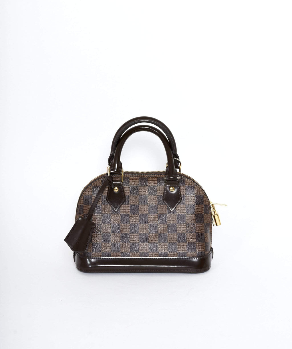 Louis Vuitton Monogram World Tour Alma BB is a pretty bright and practical  bag. It features protective studs on the bott…