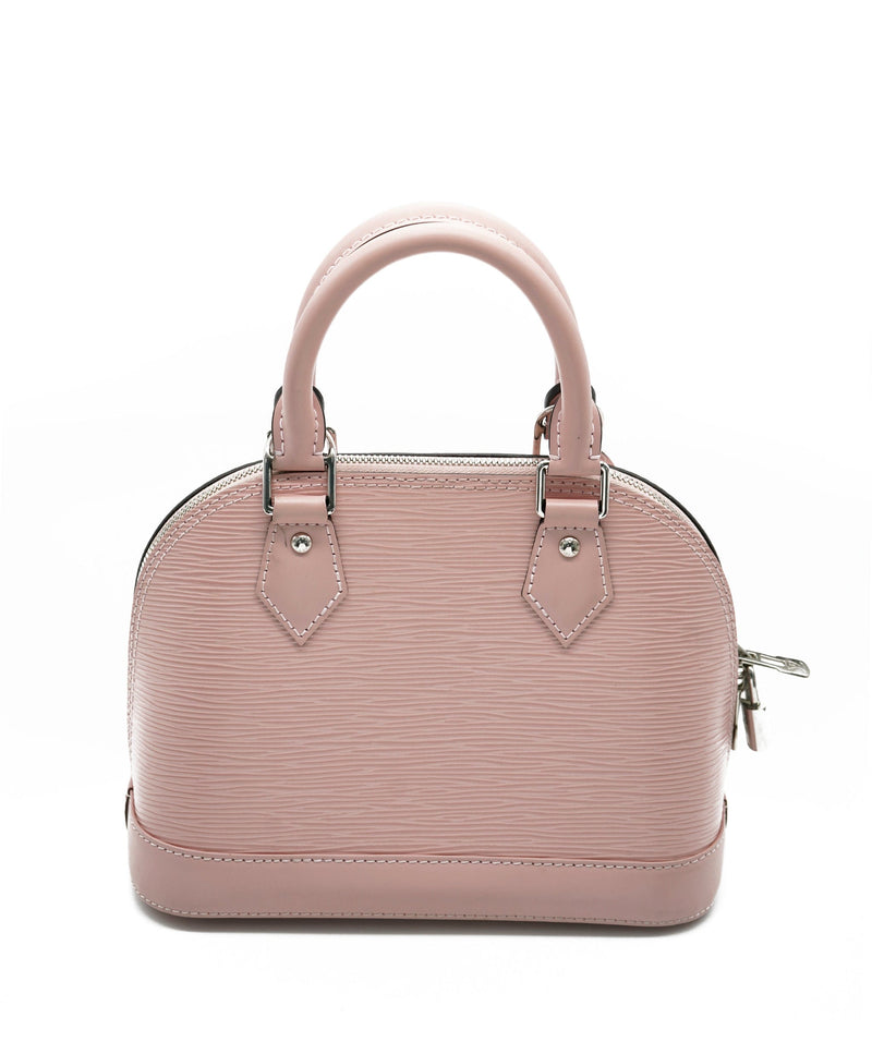 Alma bb leather handbag Louis Vuitton Pink in Leather - 32584857