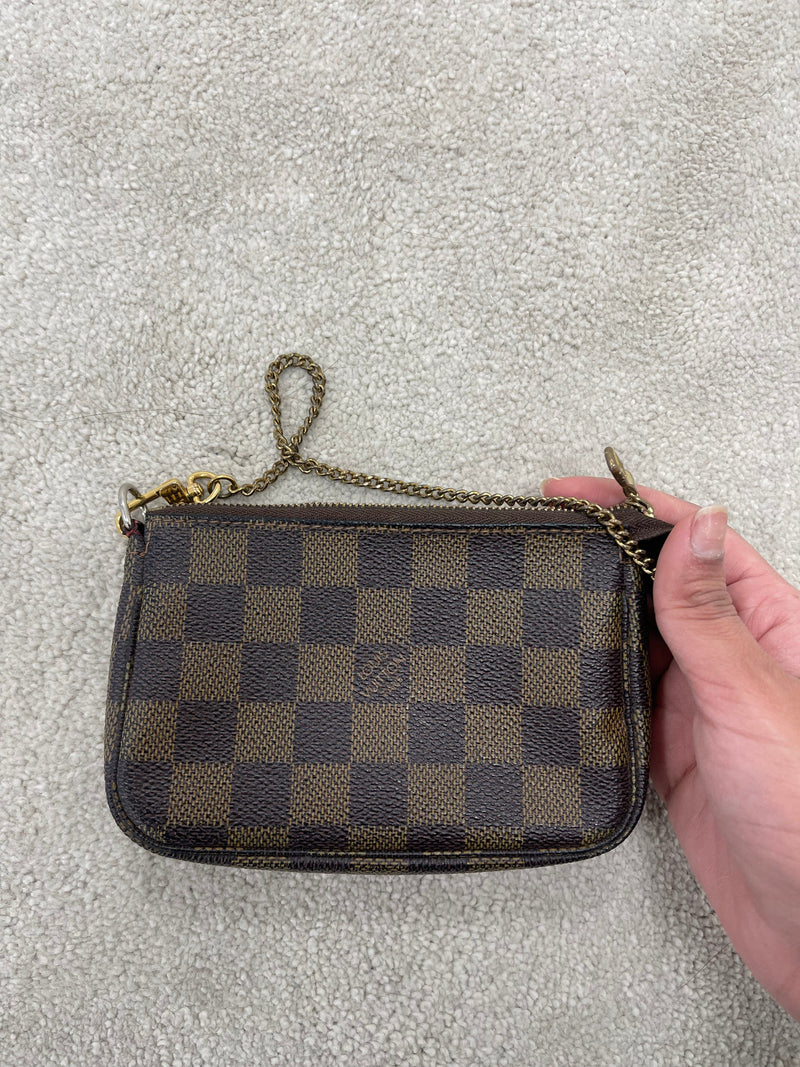 LOUIS VUITTON Damier Ebene Mini Pouch Bag AGL2403 – LuxuryPromise