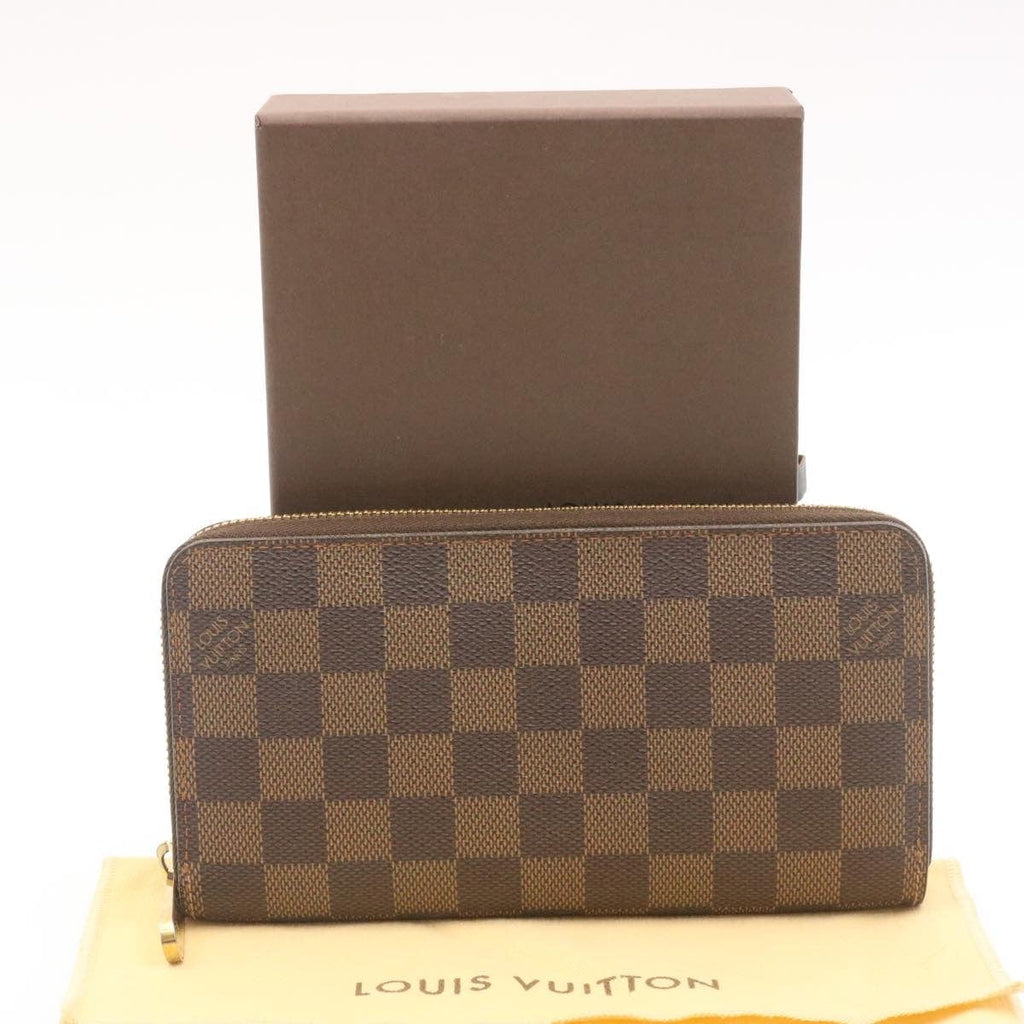 Louis Vuitton Damier Ebene Dark Brown Zippy Wallet - A World Of