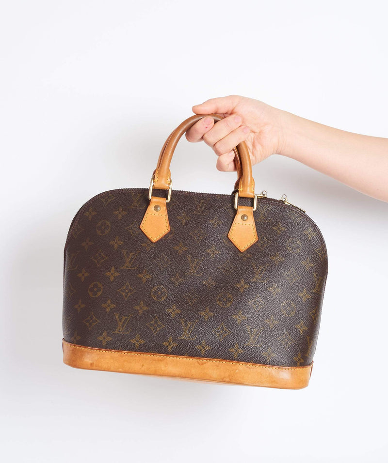 Louis Vuitton Alma Handbag 390908