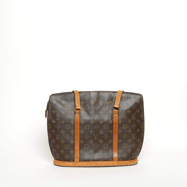 The vintage Louis Vuitton Babylone really does the trick for a laptop