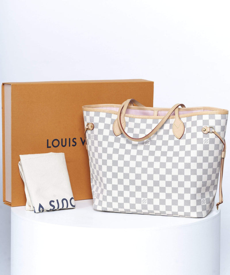 Louis Vuitton small shopping bags and a dust bag