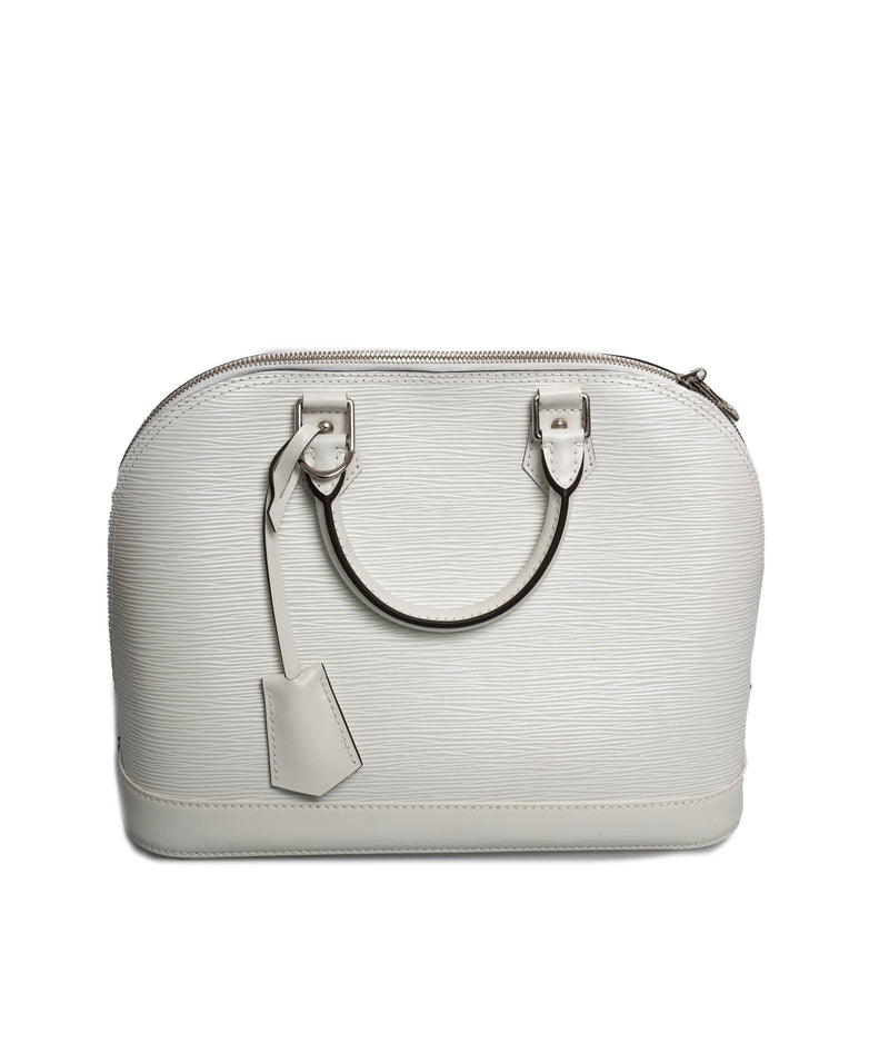 Vintage Louis Vuitton Alma in white EPI leather