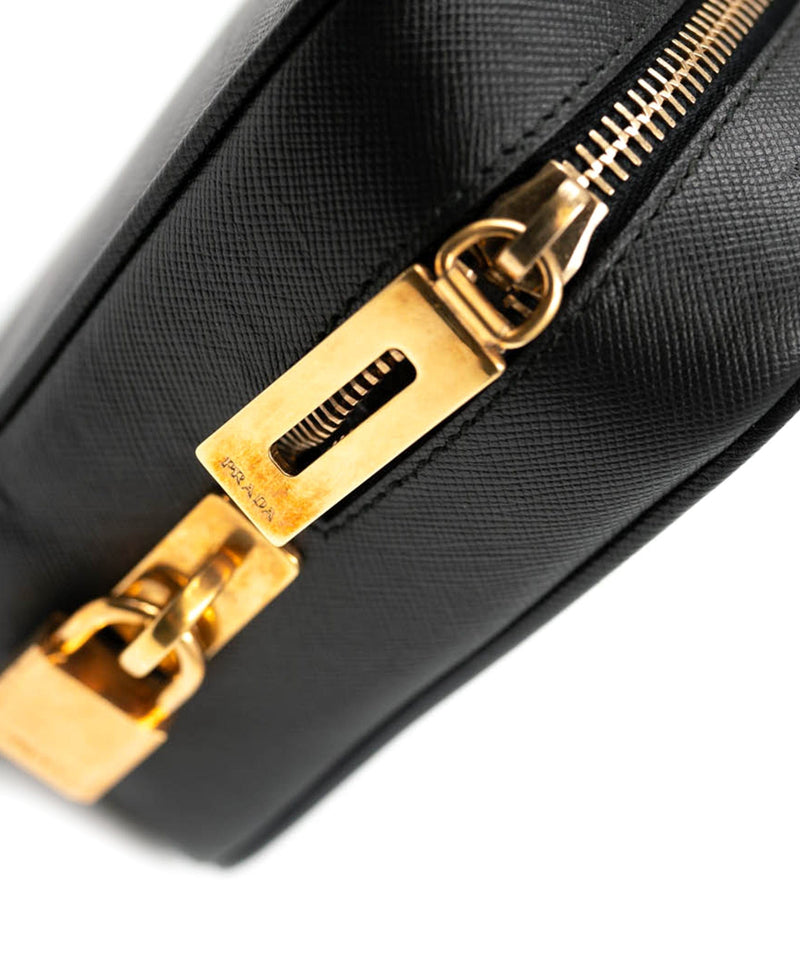 Prada black discount and gold bag